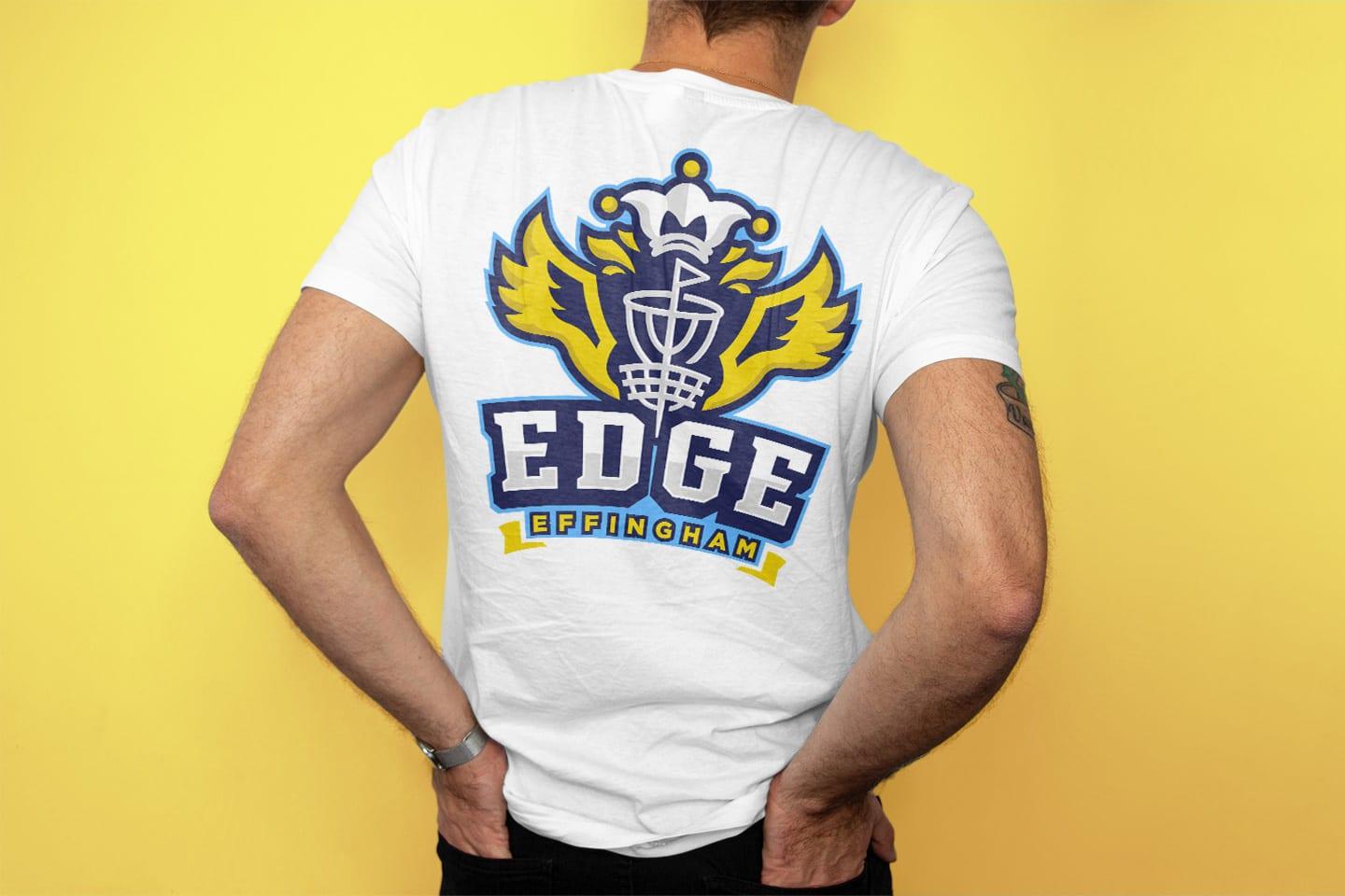 http://res.cloudinary.com/twhite/image/upload/f_auto,q_auto/v1620764102/design/EDGE/EDGE_EFFINGHAM_DiscGolf_Shirt_Mockup_Back_2021_d9p9os.jpg